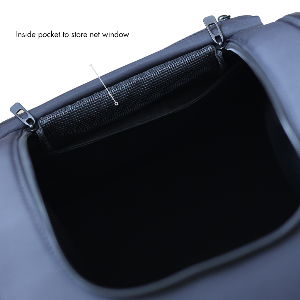 Inside pocket of a pet carrier with zipper for storing a net window.