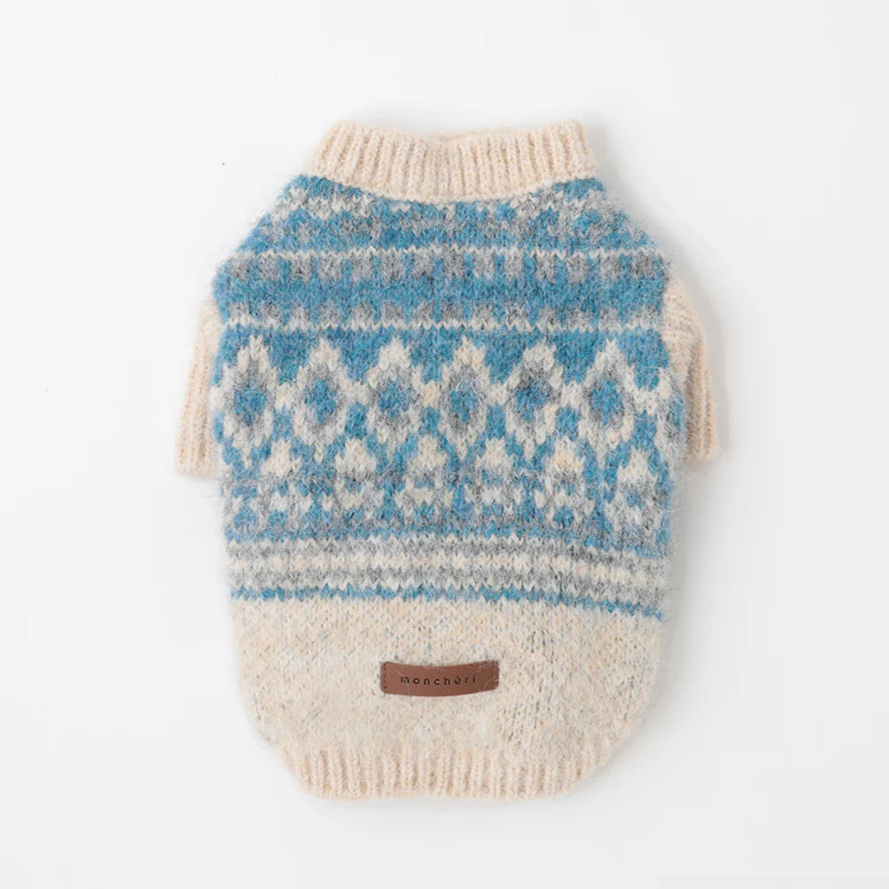 Knitted dog sweater with blue and beige pattern on a white background