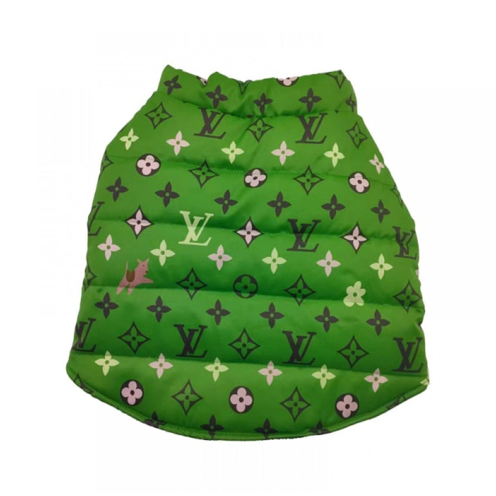 Green quilted bag with a pattern on a white background