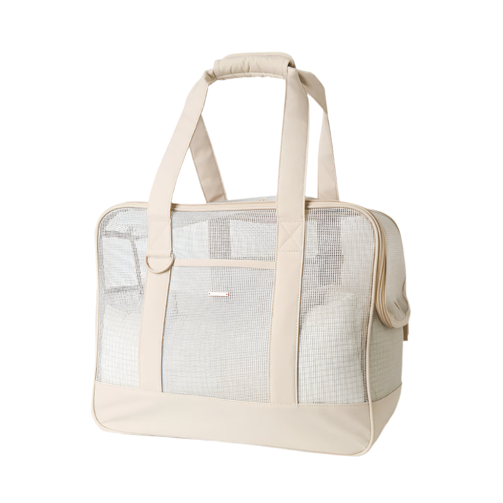 Beige pet carrier with mesh side on a white background