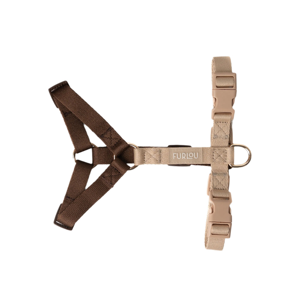 Brown and beige dog harness on a white background