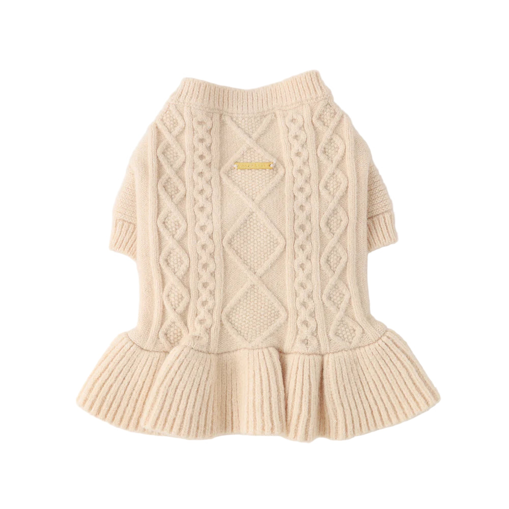 Beige knitted dog sweater on a white background