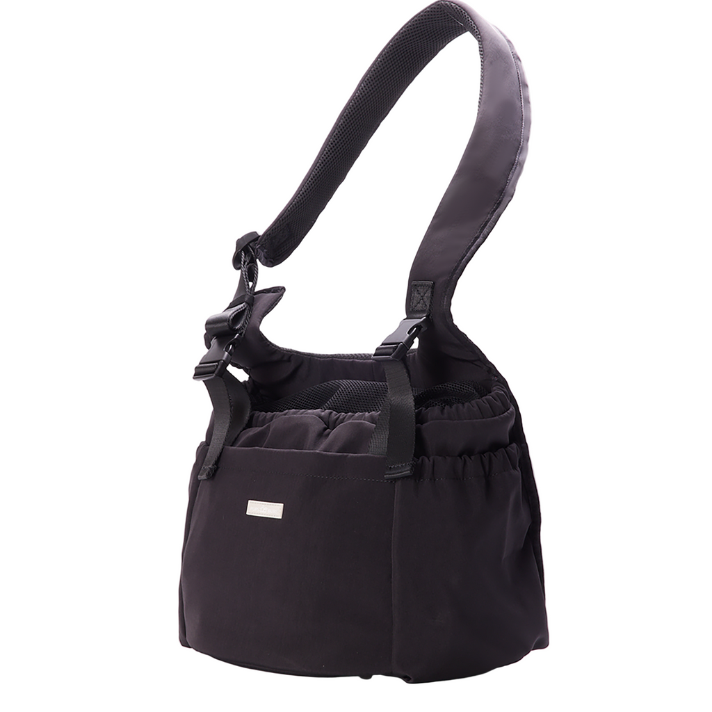 Black shoulder bag with straps on a white background