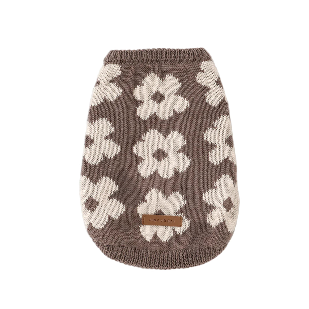 Knitted dog sweater with flower pattern on a white background