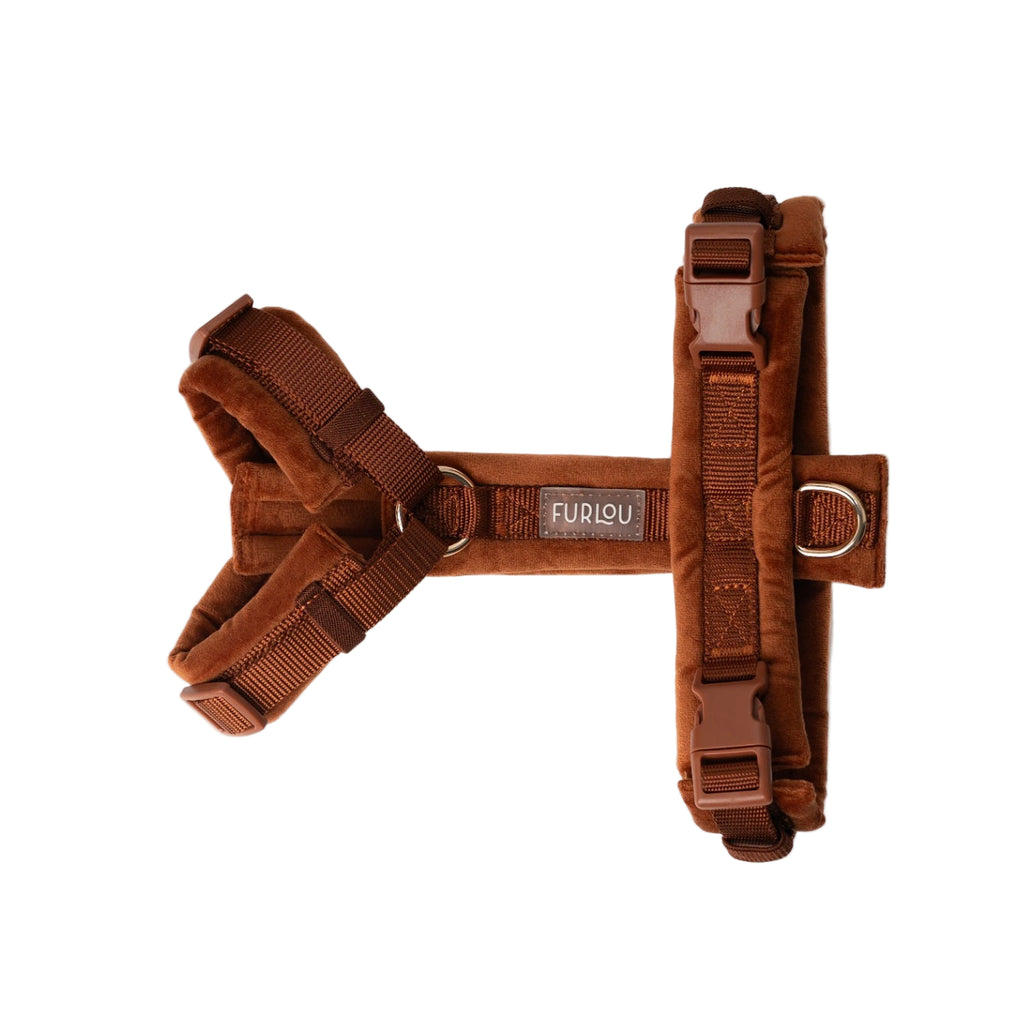 Brown dog harness with visible brand logo on a white background