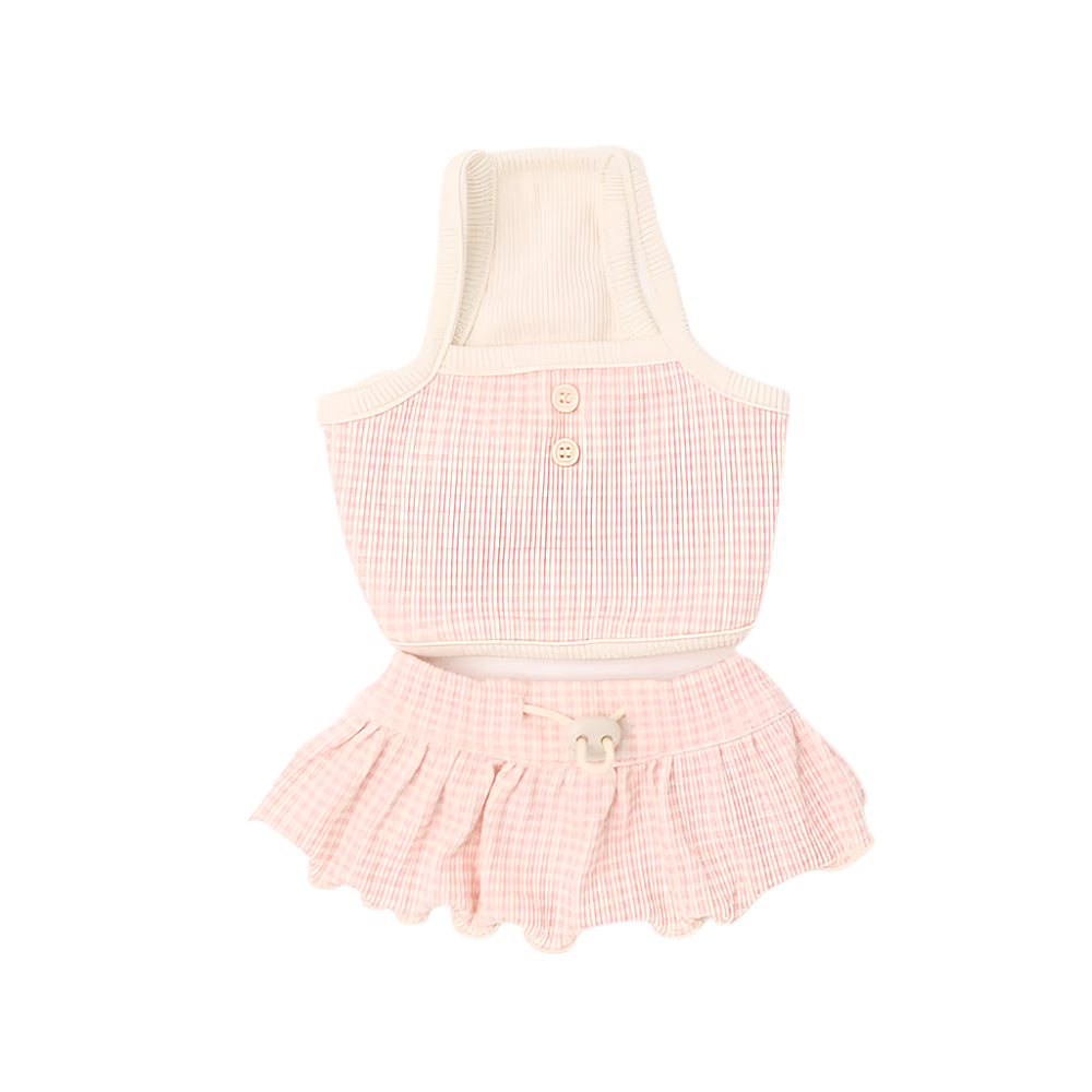 Pink checkered dress with white collar on a white background