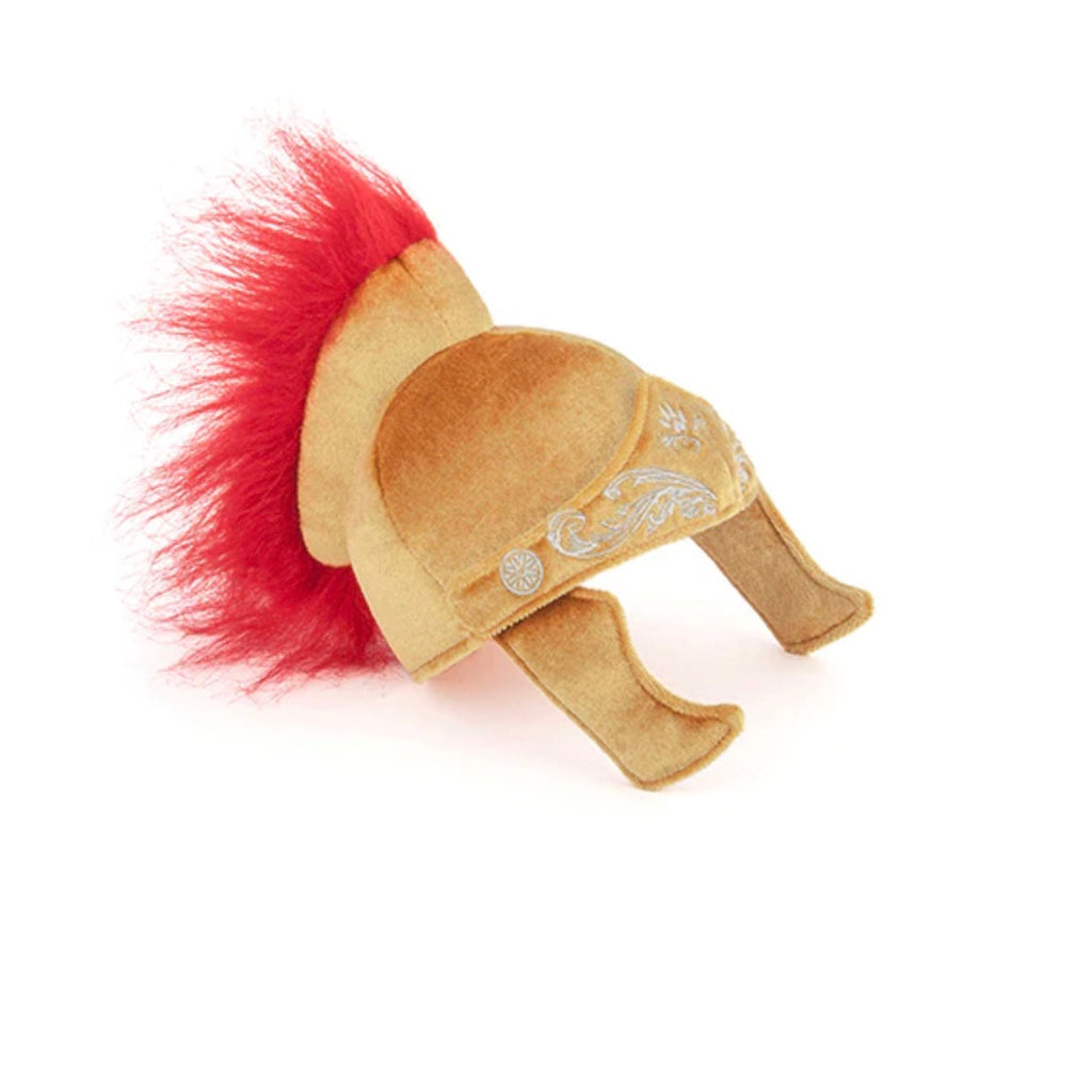 Toy Roman helmet with red plume on a white background