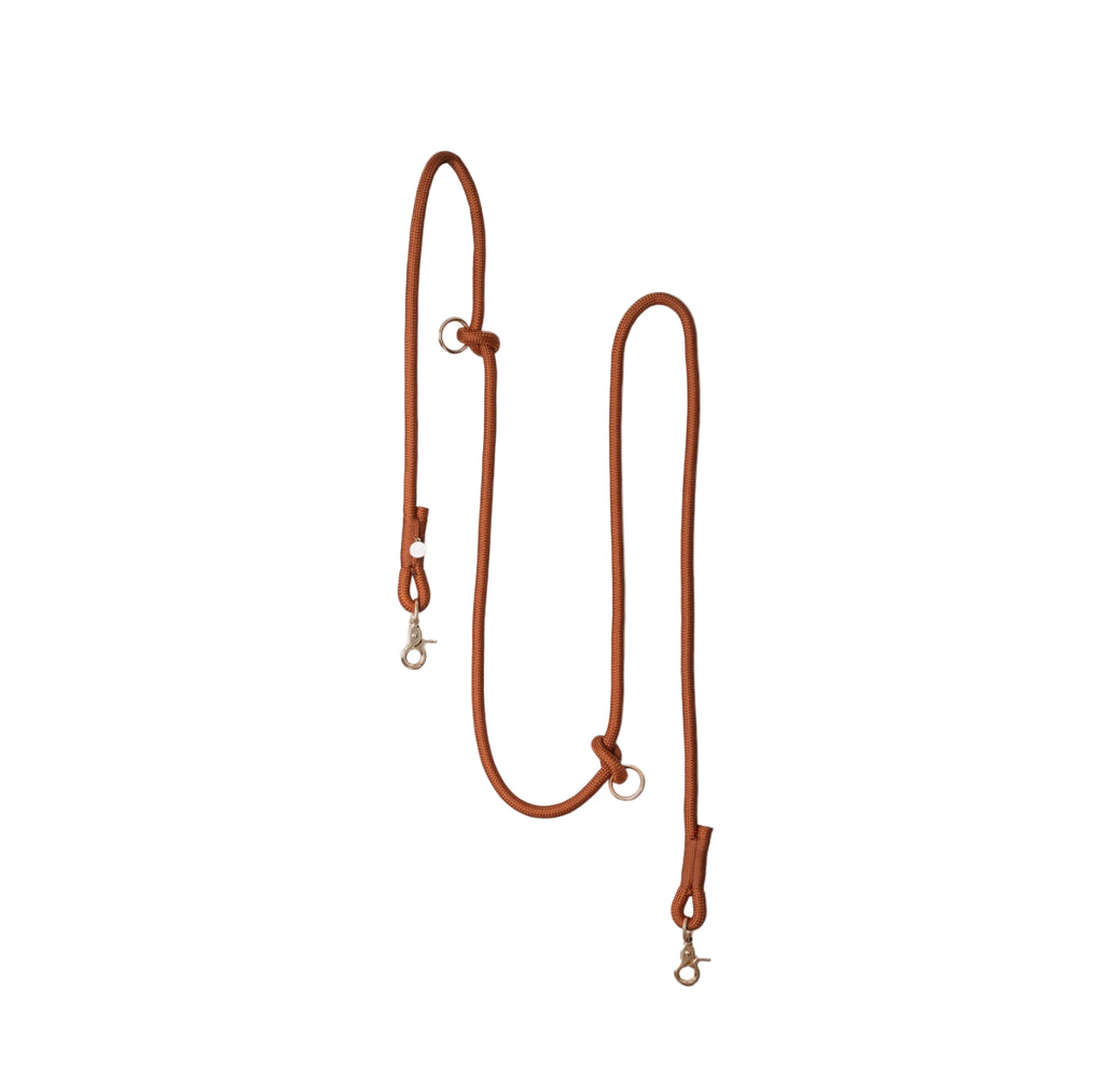 Brown rope dog leash on a white background